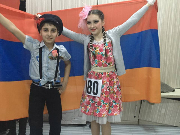 Azerbaijani dancers trying to hamper the performance of the Armenian ensemble