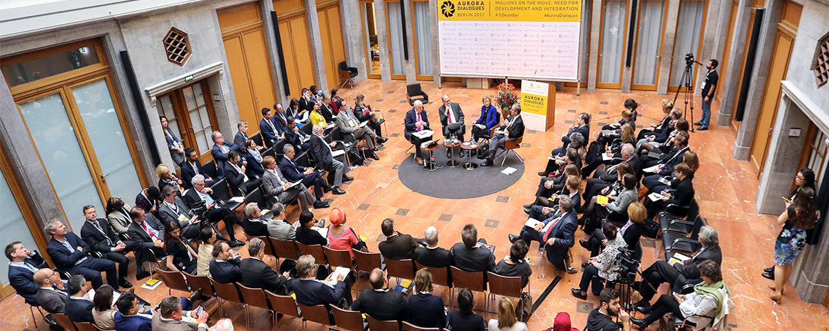 Experts gathered at the Aurora Dialogues Berlin to analyze key challenges in addressing the ongoing migration crisis