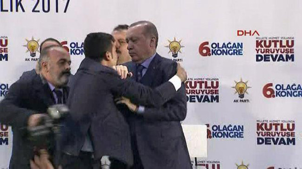 Turkish Young Man Frightens Erdogan Trying to Hug Him: video
