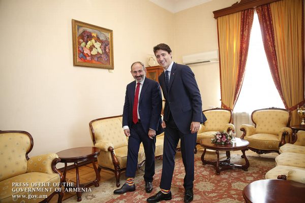 Nikol Pashinyan and Justin Trudeau in tri-colored socks