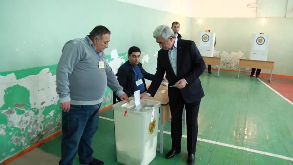 Armenian Ex-President votes quietly, does not answer questions