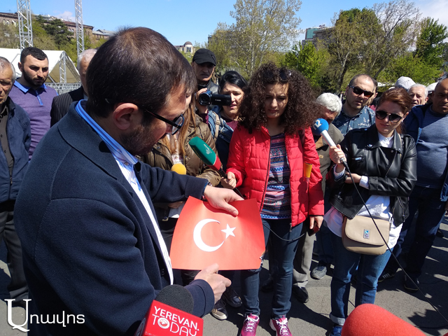 Gegham Manukyan burns Turkish paper flag in response to peace activists
