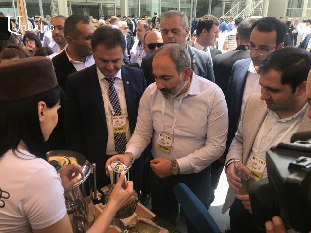 Pashinyan tastes local beer, cheese, and canned meat