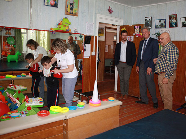 Congressman Frank Pallone and Congressional staff member James Johnson take a tour of Stepanakert's Lady Cox Rehabilitation Center with Executive Director Vardan Tadevosian.