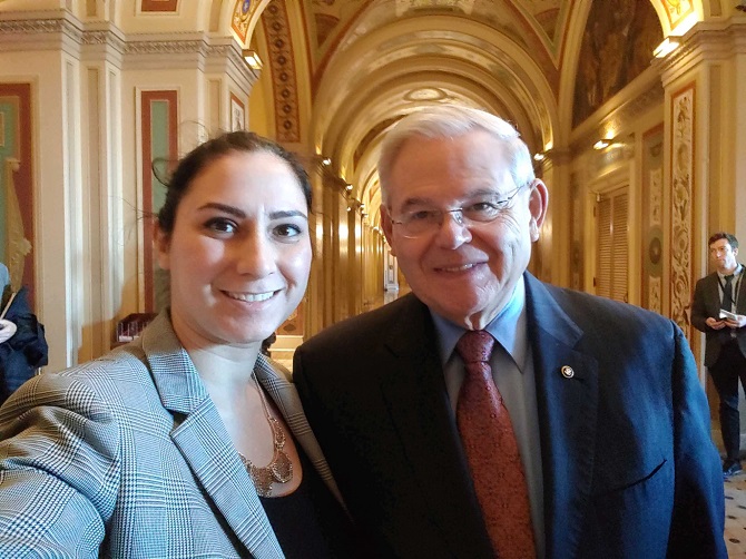 ANCA Government Affairs Director Tereza Yerimyan with Armenian Genocide Resolution champion Sen. Robert Menendez (D-NJ) following the overwhelming Senate Foreign Relations Committee vote to sanction Turkey. S.2641, led by Chairman Jim Risch (R-ID) and Sen. Menendez, was adopted by 18-4.