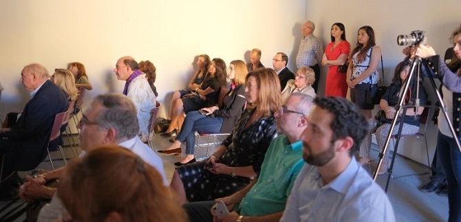 The audience at the Western USA premiere of the YMCA Exhibit listening to Dr. Adalian