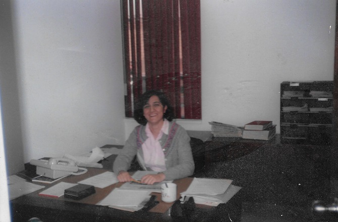 Armenian Weekly editor Muriel “Mimi” Parseghian” at her desk at the then-newly opened Hairenik building in Watertown, Mass. “Most articles submitted to us came by mail or sometimes by FedEx. It was not unusual for someone to dictate over the phone, which was a challenge.” (Photo: Hairenik Archives)