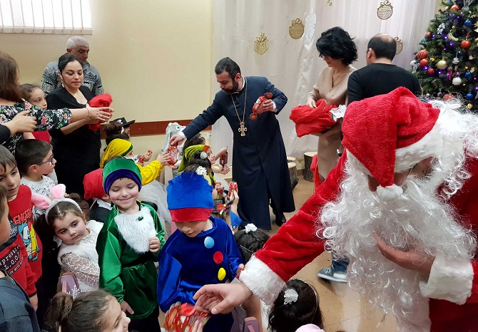 Christmas Party by Preschool students and Santa Claus gifts