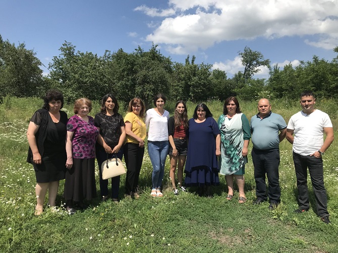 Former president and current senior advisor Ripsime Biyazyan with Suzanna Avdalyan and other staff from Medovka school, July 2019