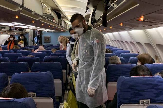 French citizens aboard of an evacuation plane before departure from Wuhan Airport, China.