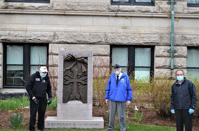 Armenian National Committee members Steve Dulgarian, Aram Jeknavorian and Ara Jeknavorian at Armenian Genocide Memorial at Lowell City Hall plaza.