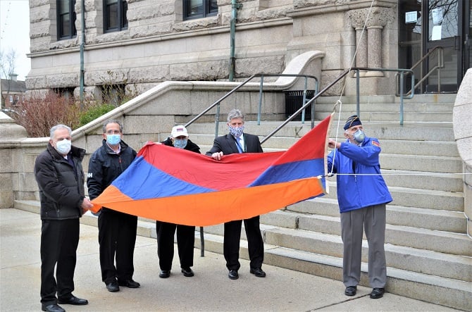 Preparing to raise the Armenian flag at Lowell City Hall are Armen Jeknavorian, Ara Jeknavorian, Steve Dulgarian, Mayor Leahy and Aram Jeknavorian.