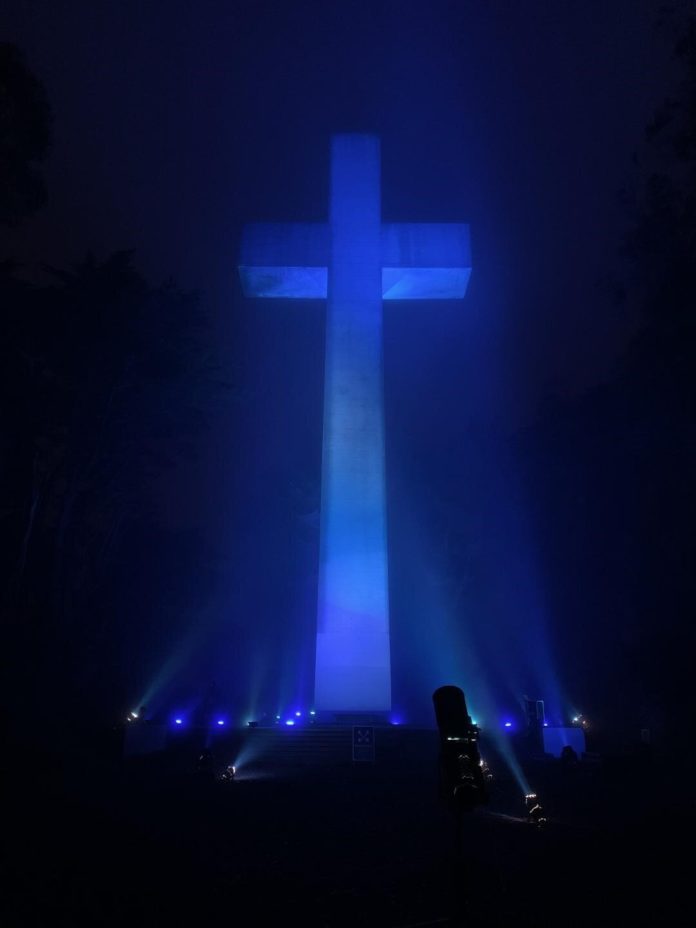 Mt. Davidson Cross illuminated in blue to honor health care workers