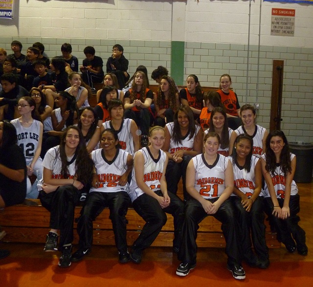 Snapshot of the Fort Lee girls’ basketball team during a school pep rally.