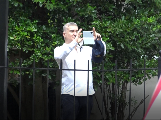 Azerbaijani Ambassador to the U.S. Elin Suleymanov videotaping as Azerbaijani demonstrators hurled toxic hate-speech at Armenian Americans demanding peace. Photo: Haykaram Nahapeyan, H1 TV.