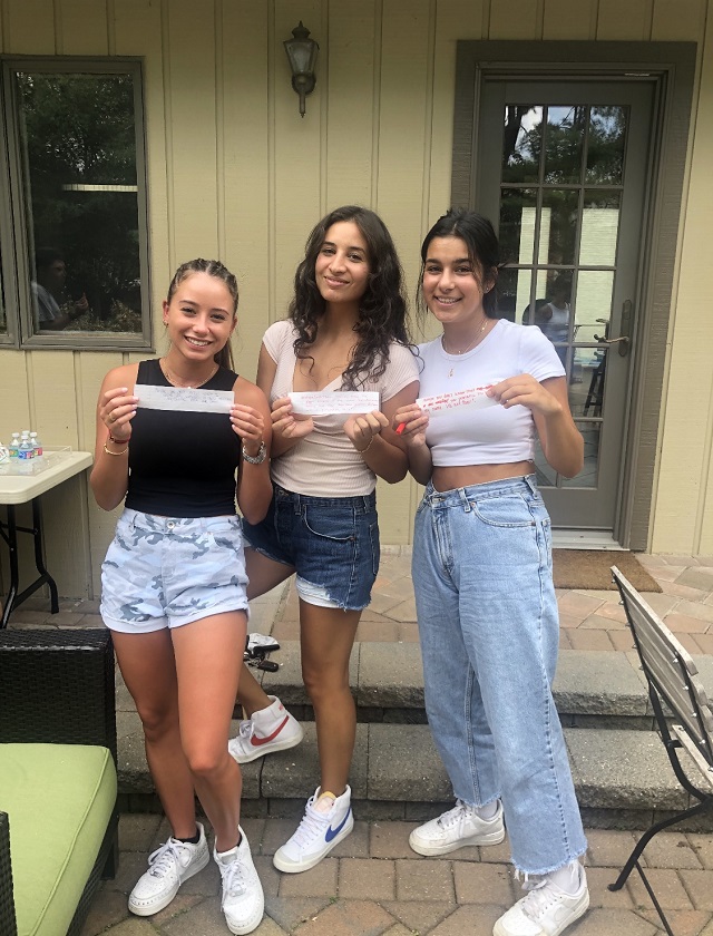 AYF members Jacqueline Fales, Katia Ariyan and Knar Alashaian proudly display their statements.