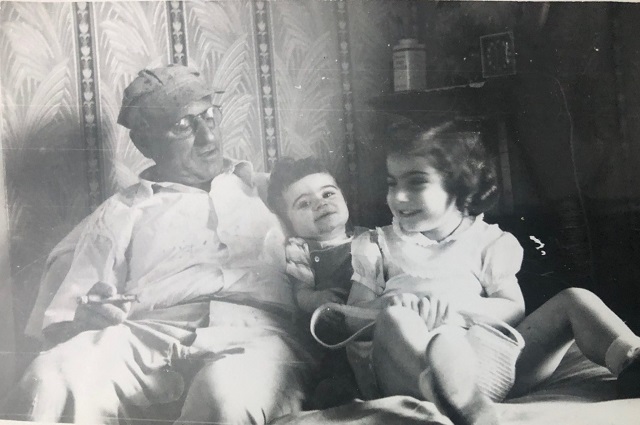 “My sister and I relaxing with Grandpa Stepan with how I remember him…cigar, wire rimmed glasses and farm clothes.”