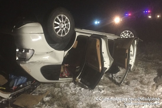“Porsche Cayenne” car ran off the roadway, collided with concrete barrier and overturned in the field
