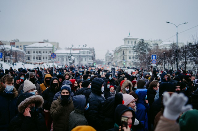 To police, ‘the camera is like a red cloth to a bull’: four journalists on covering Russia’s pro-Navalny protests