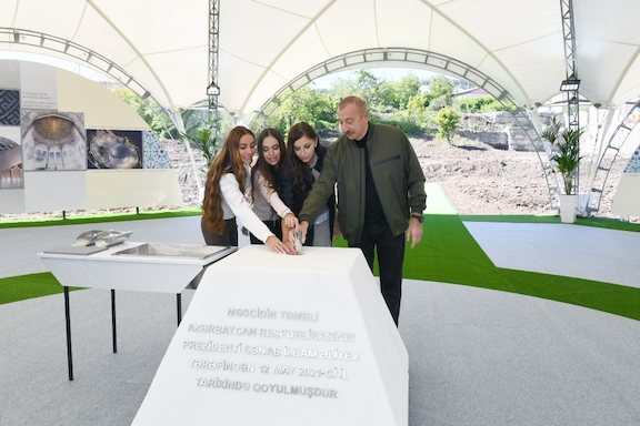 In Shushi, Aliyev lays foundation for new mosque. Asbarez