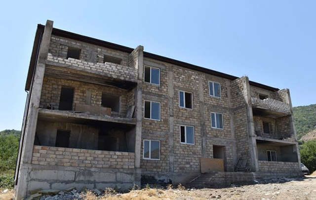 A three-storey residential building is being built in Chartar