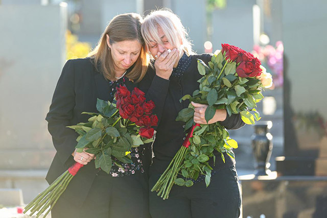 Ambassador Tracy paid her respects to those who lost their lives in last year’s conflict. (Photos)