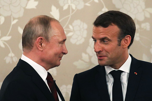 Putin tells Macron Ukraine settlement is possible only with respect for Russia interests
