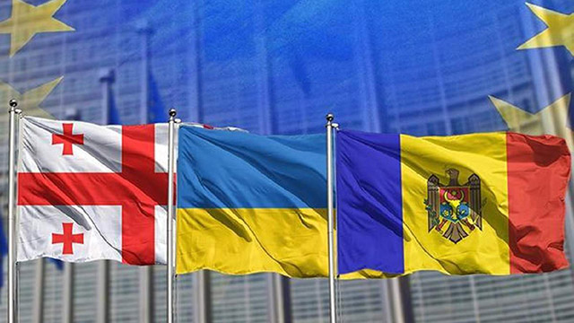European Union agrees to begin examining bids from Ukraine, Georgia and Moldova to join bloc