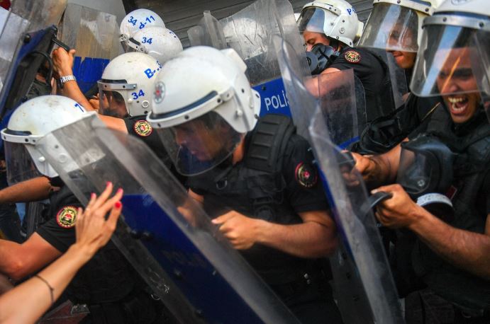 Istanbul police beat, tear gas, detain journalists while breaking up public protest