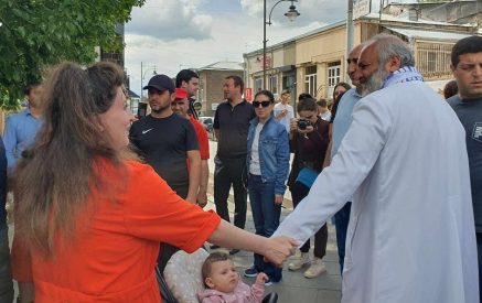 At every step on the streets of Gyumri, Bishop Bagrat Srbazan is greeted, hugged, and photographed with by the locals