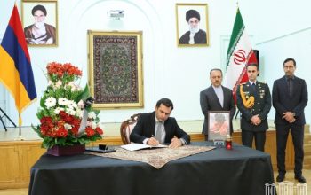 Hakob Arshakyan writes a condolence note in Book of Condolences opened at Iranian Embassy in Armenia